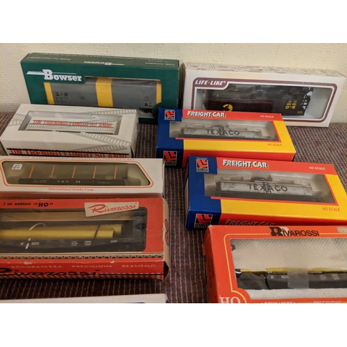 350 - Mostly boxed freight cars to include some tanker cars, carriages, rolling stock by Riva Rossi, Lione... 