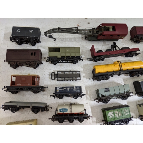 318 - Approximately 46 cargo/freight carriages and other railway stock to include coal trucks, tanker cars... 