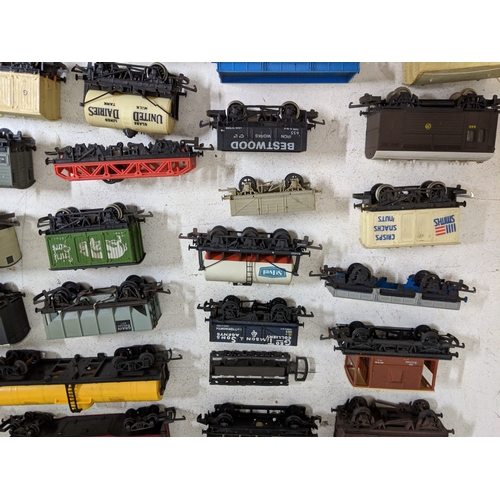 318 - Approximately 46 cargo/freight carriages and other railway stock to include coal trucks, tanker cars... 