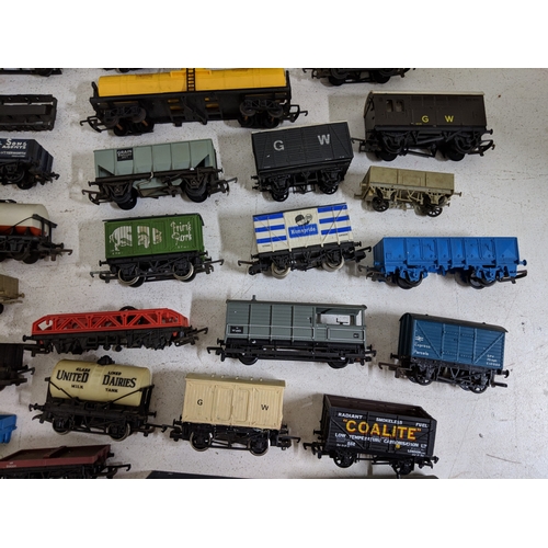 318 - Approximately 46 cargo/freight carriages and other railway stock to include coal trucks, tanker cars... 