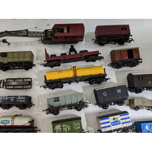 318 - Approximately 46 cargo/freight carriages and other railway stock to include coal trucks, tanker cars... 