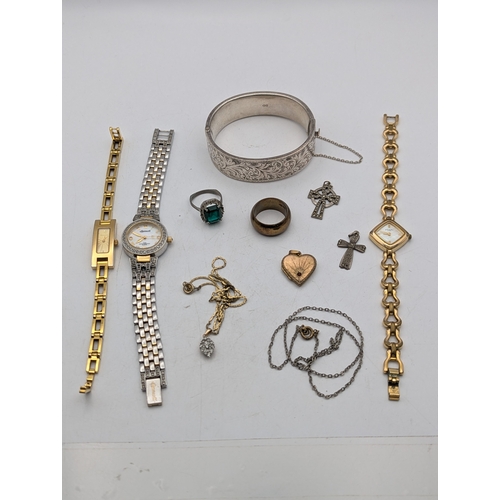 105 - A mixed group of jewellery and three ladies wristwatches to include a silver bangle, 28.6g, gold pla... 