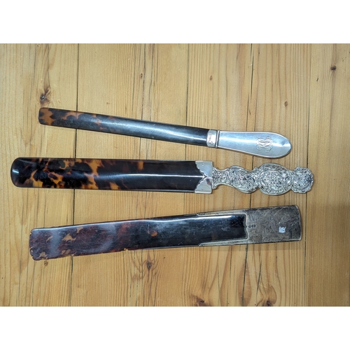 107 - Three silver handled and tortoiseshell page turners, one example by Mappin & Webb Ltd, hallmarked Bi... 