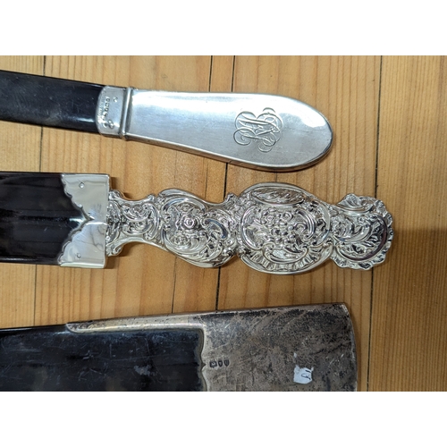 107 - Three silver handled and tortoiseshell page turners, one example by Mappin & Webb Ltd, hallmarked Bi... 