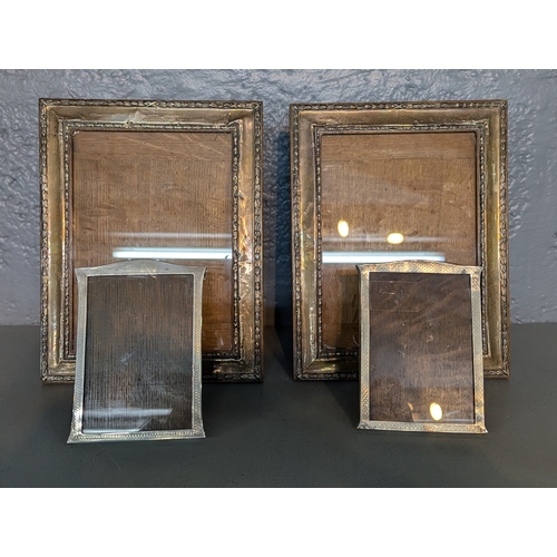 119 - Two pairs of silver fronted photograph frames, the larger example hallmarked Birmingham 1910
Locatio... 