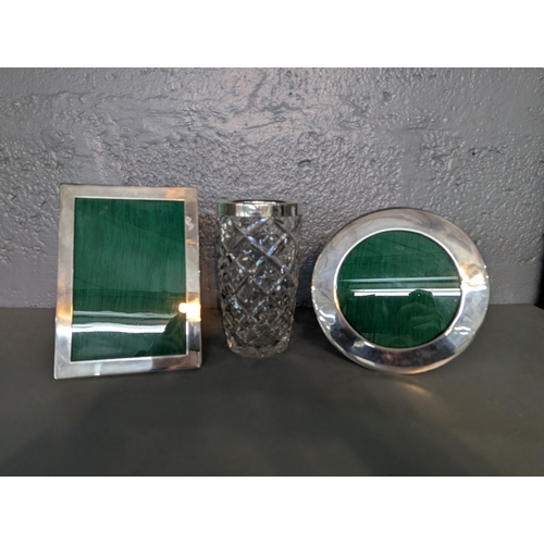 120 - A mixed group to include a silver rimmed crystal cut glass vase and two silver fronted photo frames
... 