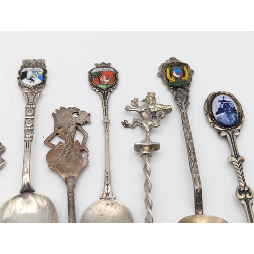 62 - Silver spoons to include six sterling silver examples with bamboo style terminals, total weight 46.2... 