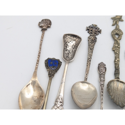 62 - Silver spoons to include six sterling silver examples with bamboo style terminals, total weight 46.2... 