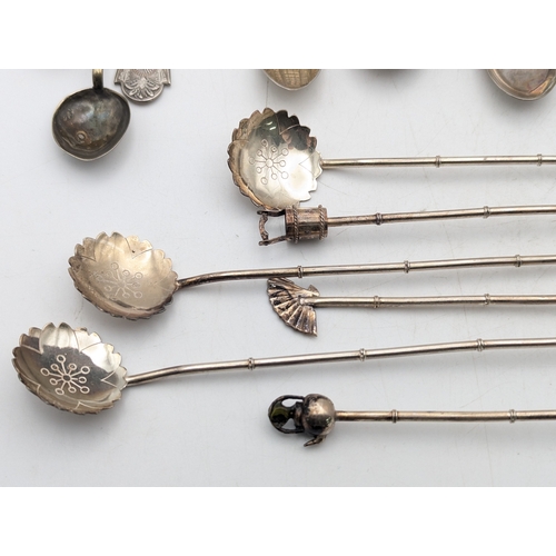 62 - Silver spoons to include six sterling silver examples with bamboo style terminals, total weight 46.2... 