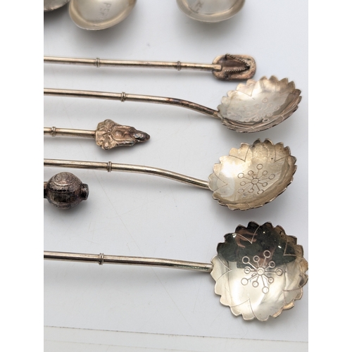 62 - Silver spoons to include six sterling silver examples with bamboo style terminals, total weight 46.2... 