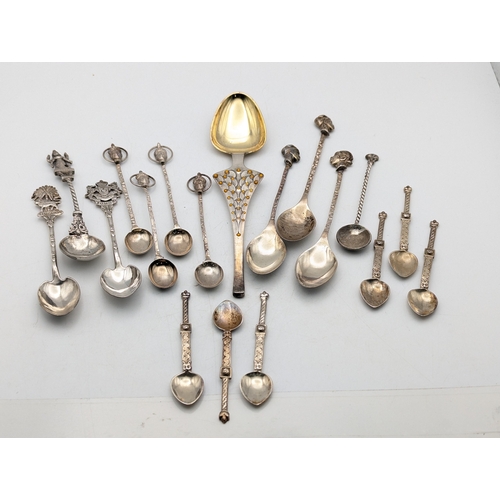 65 - A selection of white metal tea and coffee spoons to include tourist examples and others, total weigh... 