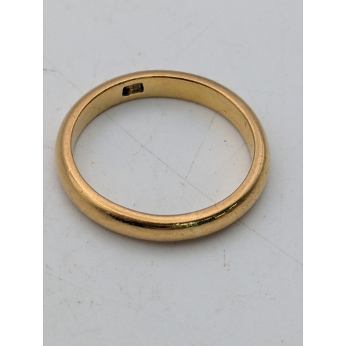 66 - A yellow gold wedding band tested as 18ct gold, size N 1/2, 5.6g
Location:R1
If there is no conditio... 