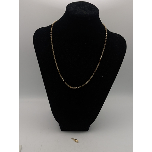70 - A 9ct gold chain link necklace with lobster claw clasp, 47cm, along with a yellow metal pendant test... 
