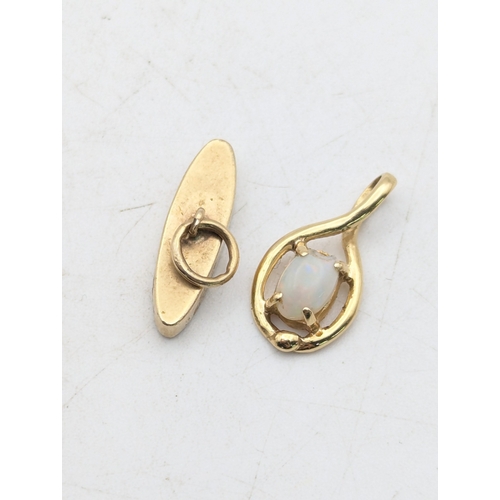 72 - A yellow metal part pendant, tested as 9ct, along with another set with an opal, tested as 9ct, tota... 