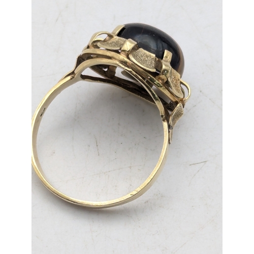 76 - A 14ct yellow gold and claw set Tiger's Eye ring stamped 585 size R, 4.2g Location:R2
If there is no... 