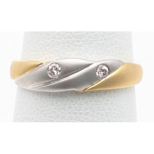 77 - An 18ct two-tone diamond set ring stamped 750 size L, 2.2g Location:R2
If there is no condition repo... 
