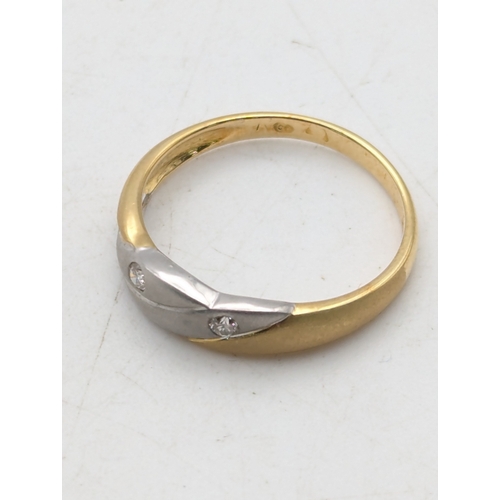 77 - An 18ct two-tone diamond set ring stamped 750 size L, 2.2g Location:R2
If there is no condition repo... 