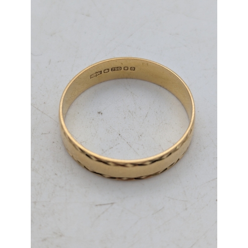 81 - An 18ct yellow gold wedding band, maker's marks LW, stamped 750, British hallmarks, size S, 2.4g Loc... 