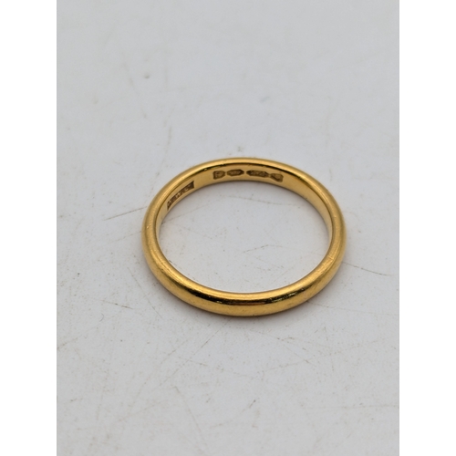 82 - A 22ct yellow gold wedding band stamped 22 with British hallmarks, maker's marks WWLd, 3.5g Location... 