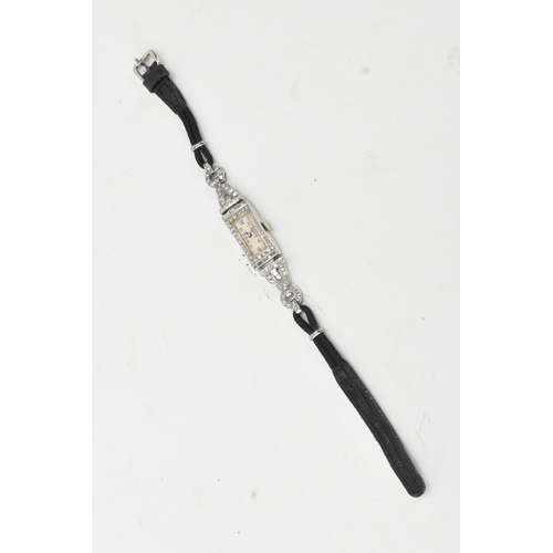 12 - An Art Deco diamond, manual wind, ladies, platinum, cocktail watch, circa 1930s, the rectangular sil... 