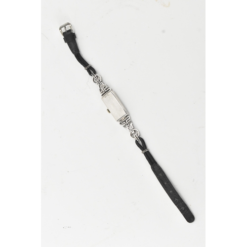 12 - An Art Deco diamond, manual wind, ladies, platinum, cocktail watch, circa 1930s, the rectangular sil... 