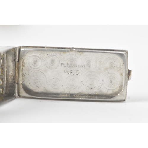 12 - An Art Deco diamond, manual wind, ladies, platinum, cocktail watch, circa 1930s, the rectangular sil... 