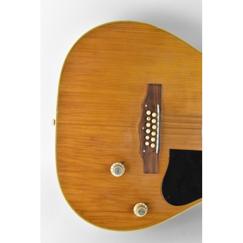146 - A vintage 1966 Hofner 12 string acoustic guitar with electric plugin option and volume and tone cont... 
