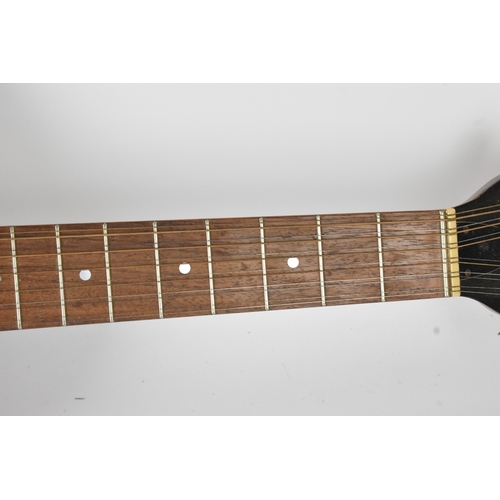 146 - A vintage 1966 Hofner 12 string acoustic guitar with electric plugin option and volume and tone cont... 