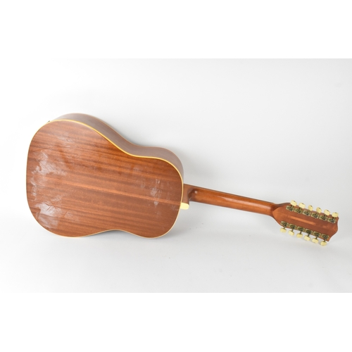 146 - A vintage 1966 Hofner 12 string acoustic guitar with electric plugin option and volume and tone cont... 