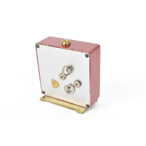 15 - An Art Deco Jaeger-LeCoultre desk/bedside 2 day alarm clock, the square cream dial with Arabic numer... 