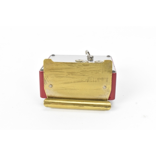 15 - An Art Deco Jaeger-LeCoultre desk/bedside 2 day alarm clock, the square cream dial with Arabic numer... 