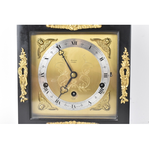25 - An Elliott of London mantel clock, retailed by Harrods, London, mid-20th century, the ebonised case ... 