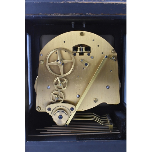 25 - An Elliott of London mantel clock, retailed by Harrods, London, mid-20th century, the ebonised case ... 