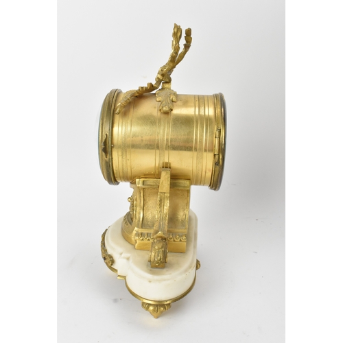 26 - A 19th century French gilt metal and marble mantle clock, the white enamel dial having Arabic numera... 