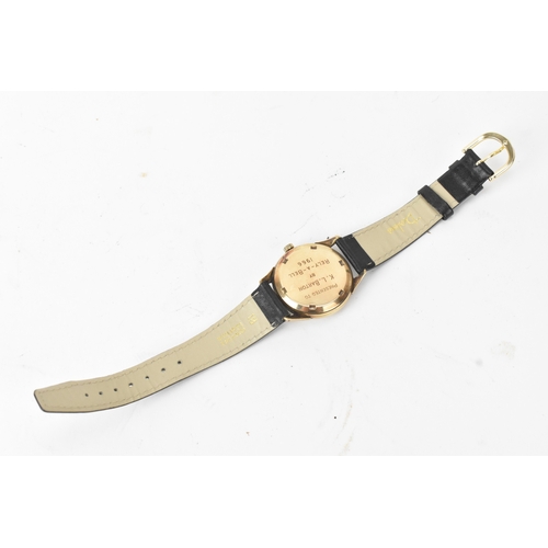 31 - A Garrard manual-wind gents 9ct gold wristwatch, circa 1960s, the silvered dial with Arabic numerals... 