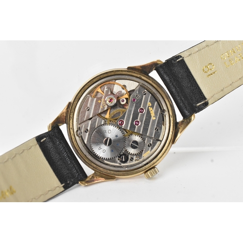 31 - A Garrard manual-wind gents 9ct gold wristwatch, circa 1960s, the silvered dial with Arabic numerals... 