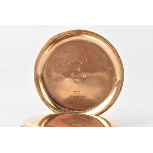 33 - A Waltham early 20th century 9ct gold open face pocked watch, the white enamel dial having Roman num... 