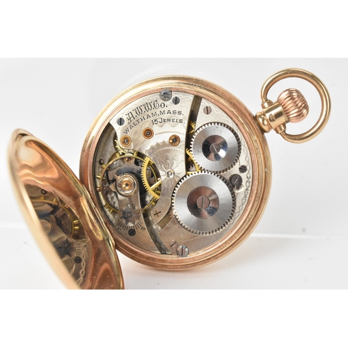 34 - A Waltham early 20th century 9ct gold full hunter pocket watch, the white enamel dial having Arabic ... 