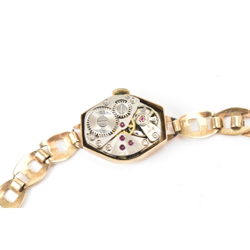 41 - A Rotary, manual wind, ladies, 9ct yellow gold wristwatch, circa 1960s, the circular silvered dial w... 
