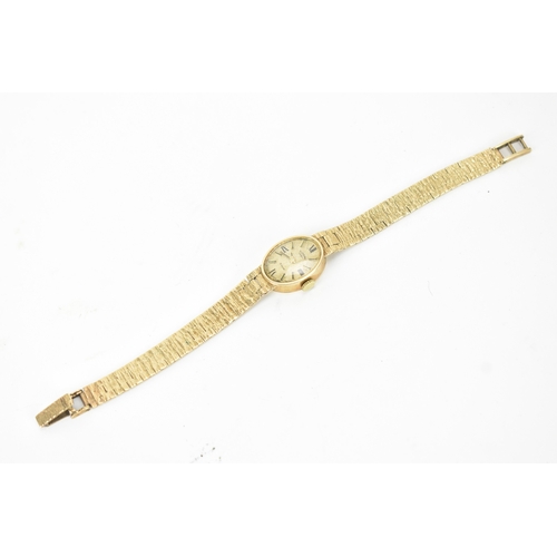 42 - A Rotary, manual wind, ladies, 9ct yellow gold wristwatch, circa 1970s, the oval textured gold-tone ... 