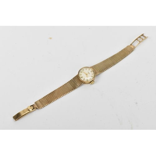 43 - A Longines, manual wind, ladies, 9ct yellow gold wristwatch, circa 1960s, the circular silvered dial... 