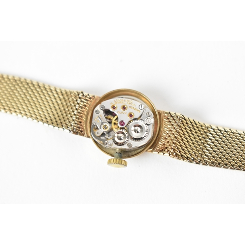 43 - A Longines, manual wind, ladies, 9ct yellow gold wristwatch, circa 1960s, the circular silvered dial... 
