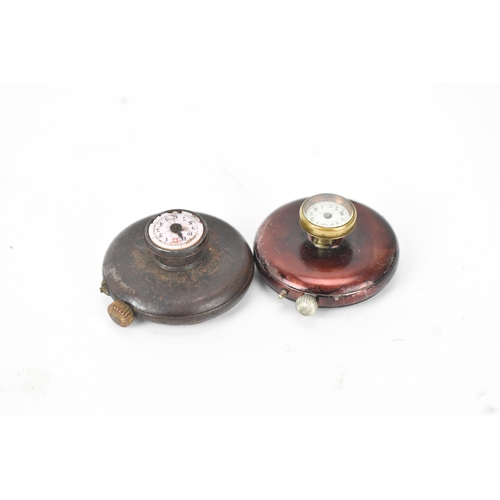 45 - Two early 20th century Swiss gunmetal cased button hole / lapel watches, each having a white enamel ... 