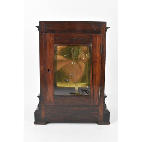 54 - A 19th century rosewood bracket clock, the silver dial signed John B Cross London, with Roman numera... 