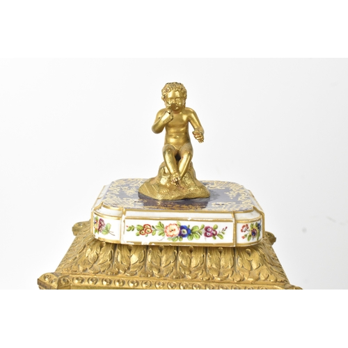 57 - A late 19th century French ormolu and Sevres-style porcelain-mounted mantel clock, the circular dial... 