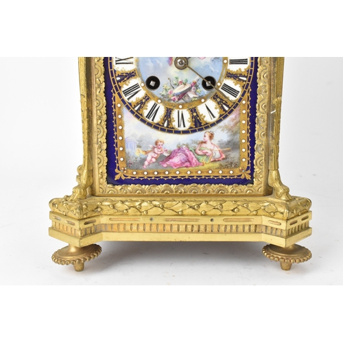 57 - A late 19th century French ormolu and Sevres-style porcelain-mounted mantel clock, the circular dial... 