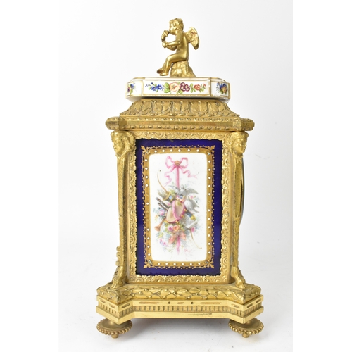 57 - A late 19th century French ormolu and Sevres-style porcelain-mounted mantel clock, the circular dial... 