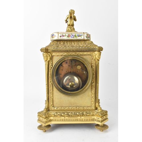 57 - A late 19th century French ormolu and Sevres-style porcelain-mounted mantel clock, the circular dial... 