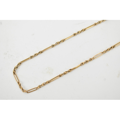 60 - A Victorian 15ct gold figaro and knot link pocket watch chain, having a bolt ring clasp and dog clip... 