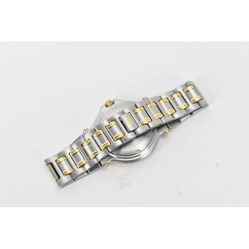 8 - A Gucci 9700M, quartz, gents, stainless steel and gold-plated wristwatch, circa 1995, the textured b... 